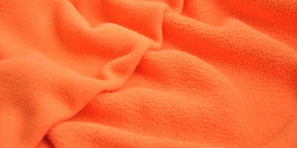 Двусторонняя ткань флис оранжевого цвета из каталога Флис.ру